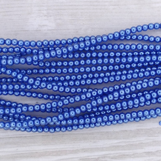 150 x 2mm round pearls in Crystal Blue