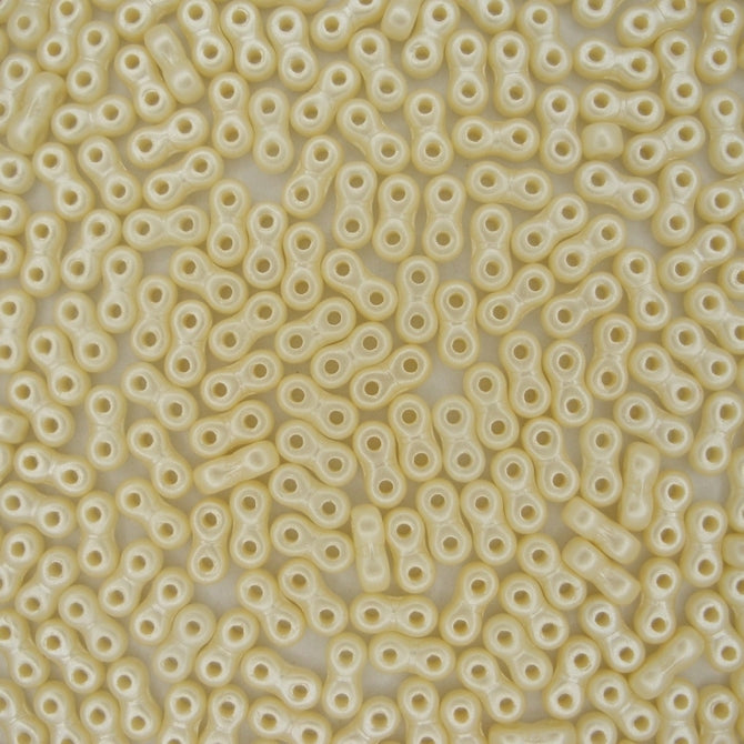 5g x 6mm Infinity beads in Pastel Light Cream