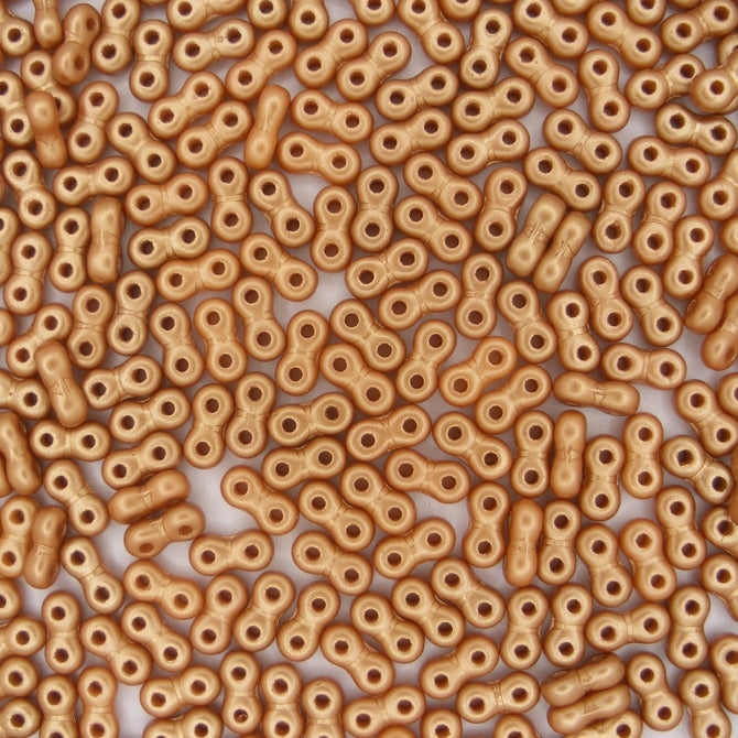 5g x 6mm Infinity beads in Pastel Amber