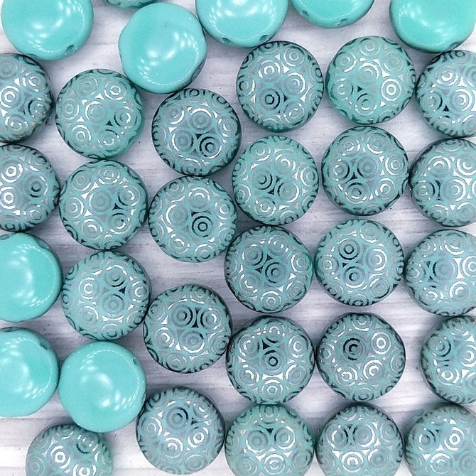 6 x 12mm candy beads in Turquoise with laser etched Chrome circles