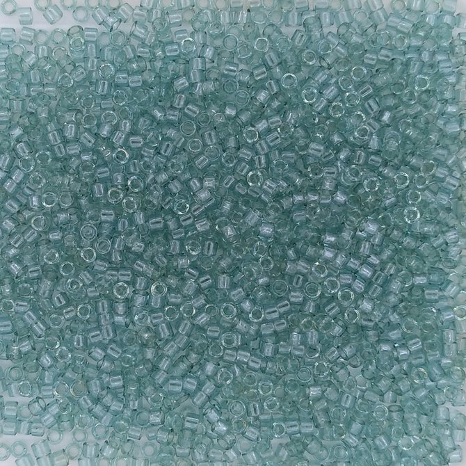 DB0112 - 5g Size 11/0 delicas in Transparent Sea Foam Lustre