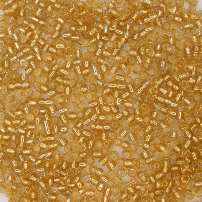 10g uneven size 11/0 seed beads in Silver lined Gold
