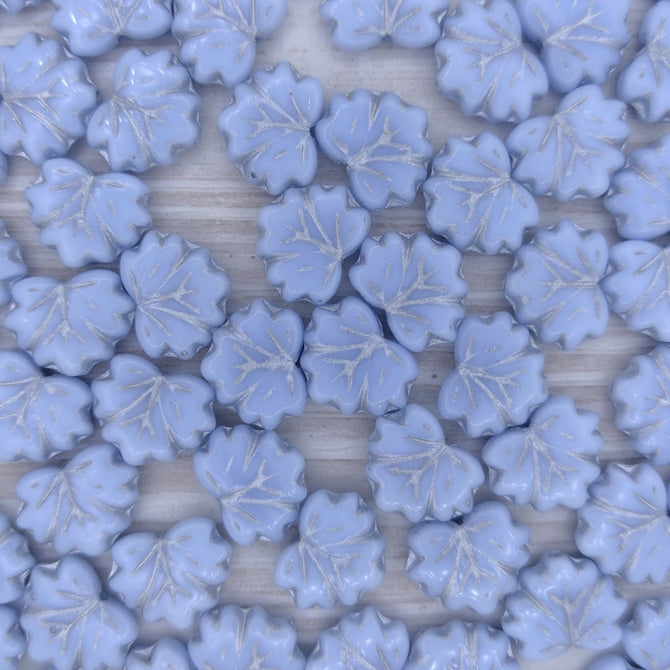 10 x Maple leaves in Pale Opaque Blue with Silver veins (13x11mm)