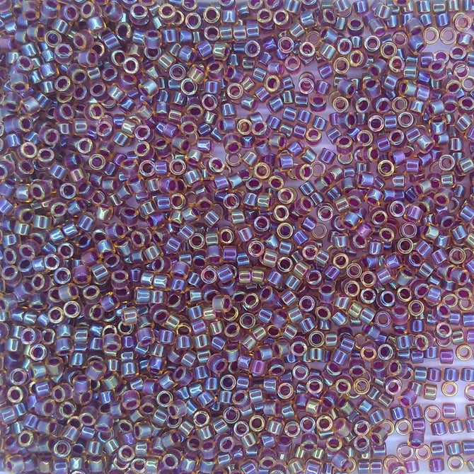 DB0061 - 1g Size 11/0 delicas in Purple lined Light Topaz Lustre