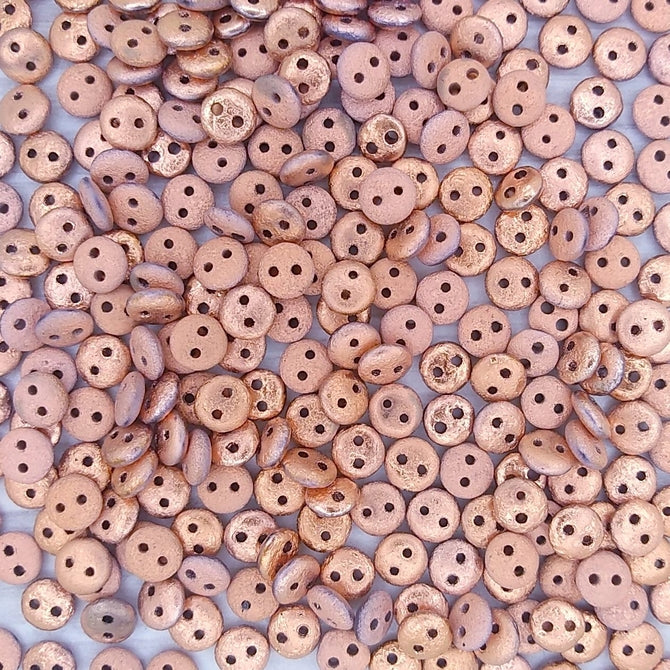 50 x two hole lentils in etched Full Capri Gold