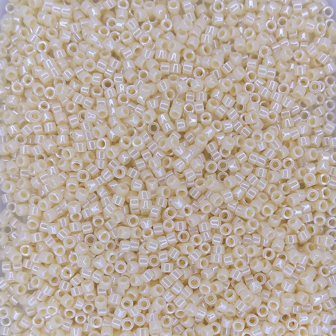 DB1560 - 5g Size 11/0 delicas in Opaque Dark Cream Lustre
