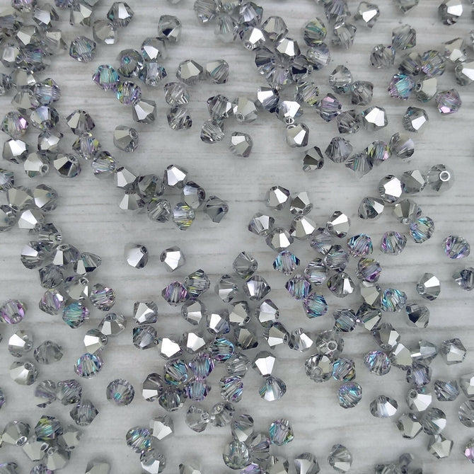 24 x 4mm bicones in Crystal Vitrail Light (Preciosa)