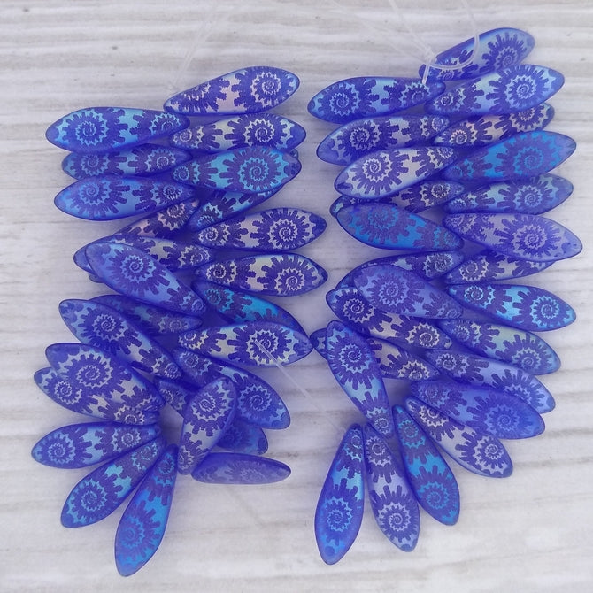 25 x Laser etched daggers in Matt Sapphire with Shell pattern (5x16mm)