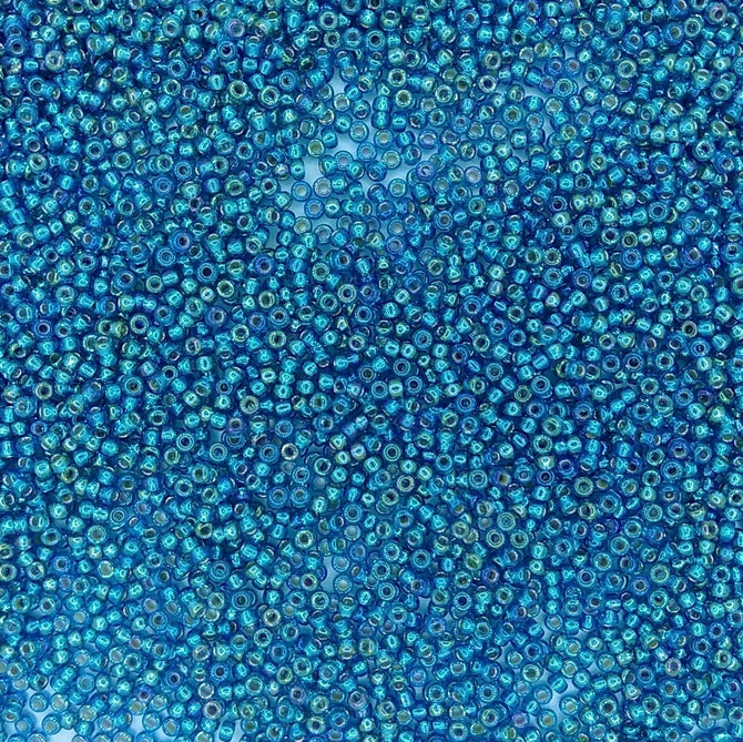 1025 - 10g Size 11/0 Miyuki seed beads in Silver lined Capri Blue AB