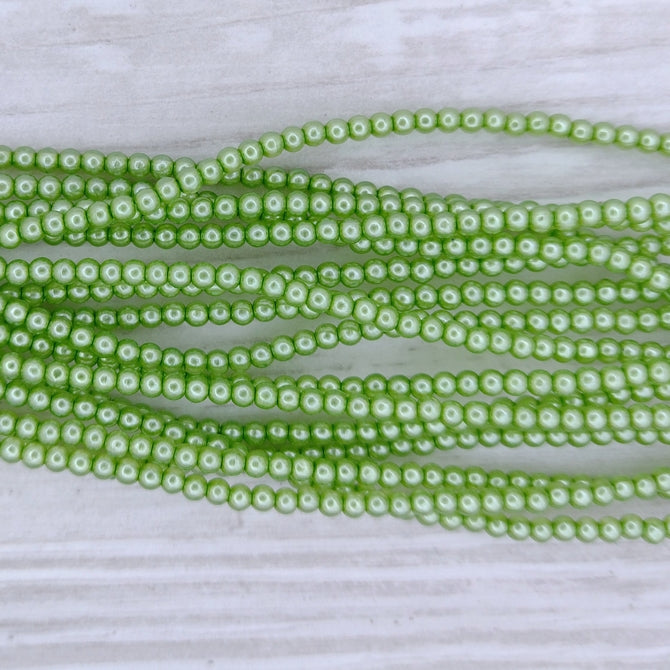 150 x 2mm round pearls in Crystal Spring Green