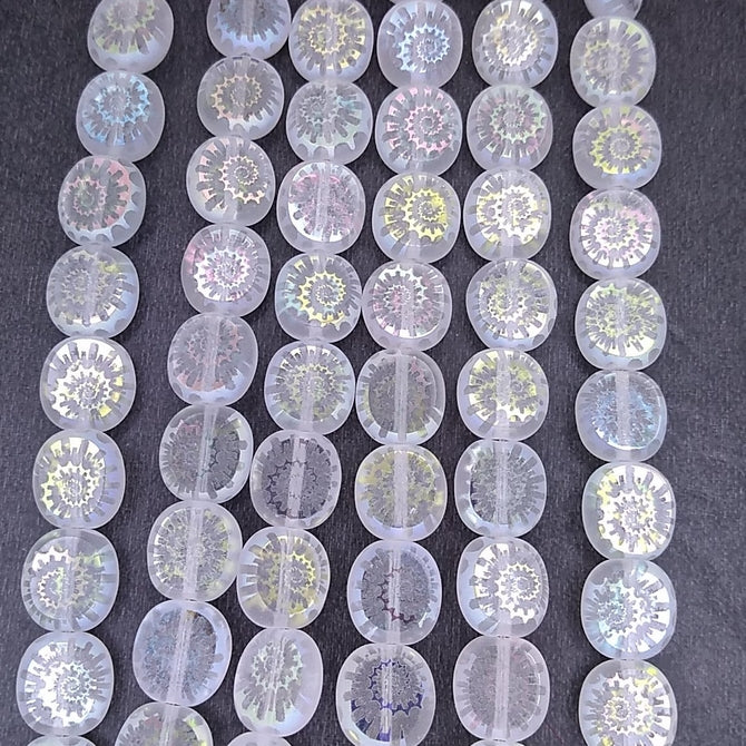 12 x table cut beads in Crystal with laser etched shell (9x8mm)