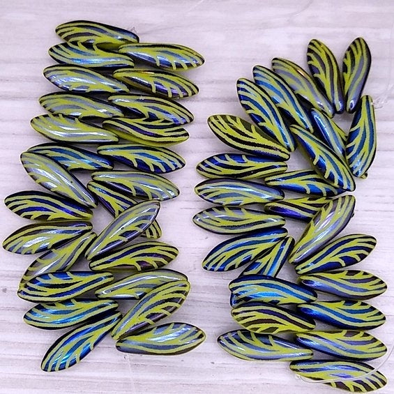 25 x daggers in Mustard with laser etched Blue dragonfly wings (5x16mm)