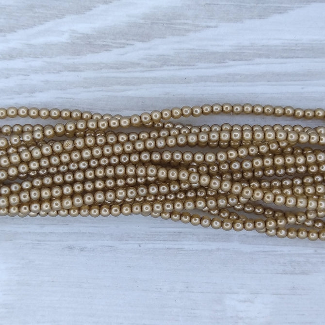 150 x 2mm round beads in Pearl Lights Latte