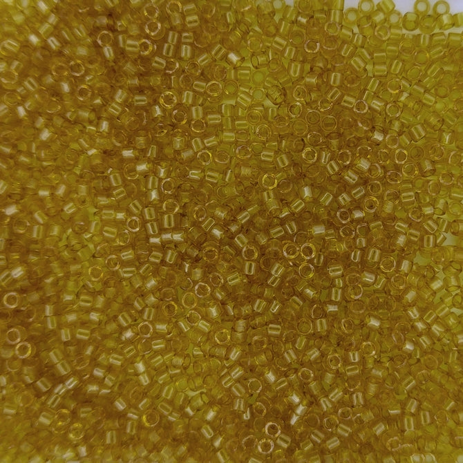 DB0118 - 1g Size 11/0 delicas in Transparent Saffron Lustre