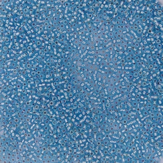 1018 - 10g Size 11/0 Miyuki seed beads in Silver lined Aqua AB