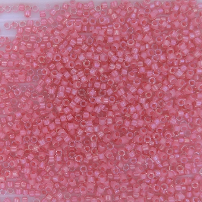 DB0070 - 5g Size 11/0 delicas in Coral lined Crystal Lustre