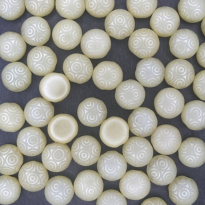 10 x 8mm candy beads in Pastel Cream with laser etched circles