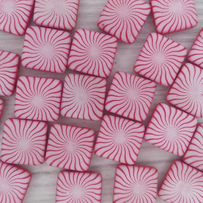 5 x 12mm square beads in Neon Cherry with laser etched sea urchin