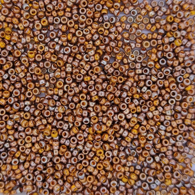 1984 - 1g Size 15/0 Miyuki seed beads in 24kt Red Gold Iris