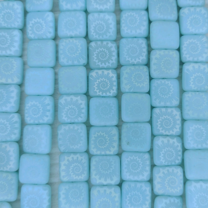 12 x 10mm beads in Matt Pale Aqua with laser etched shell
