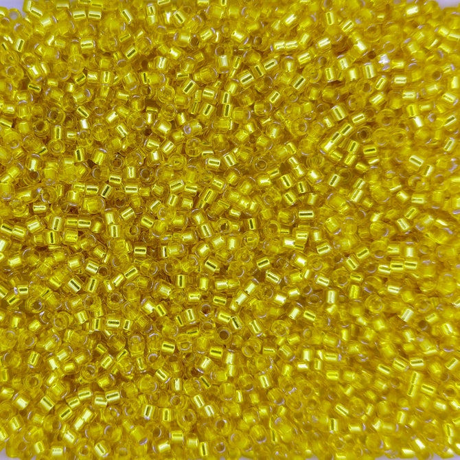 DB0145 - 25g Size 11/0 delicas in Silver lined Yellow