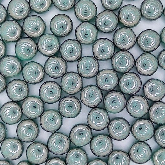 10 x 8mm candy beads in Turquoise with Laser etched Rose