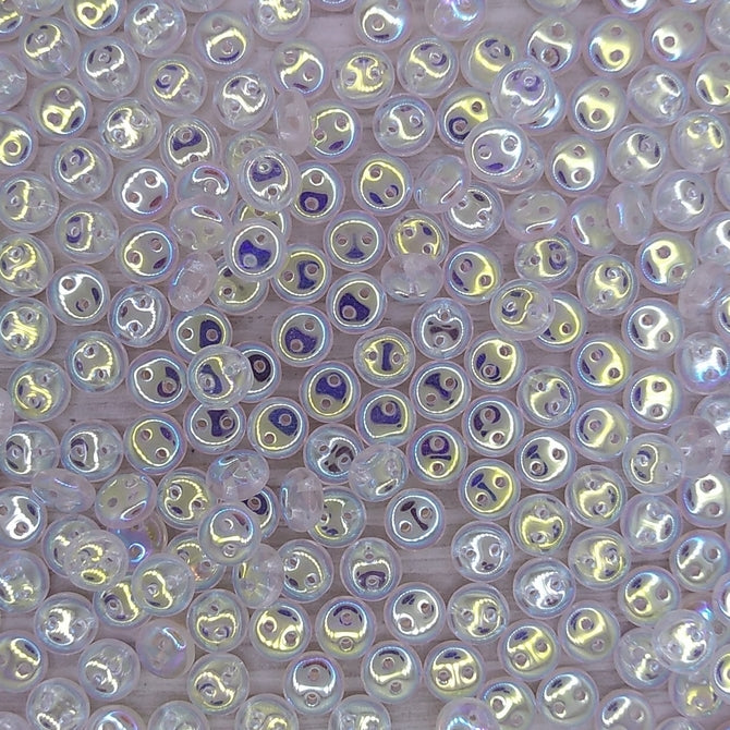 25 x two hole lentils in Crystal AB