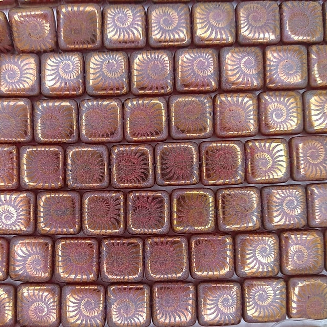 12 x 10mm beads in Red with laser etched Bronze shell