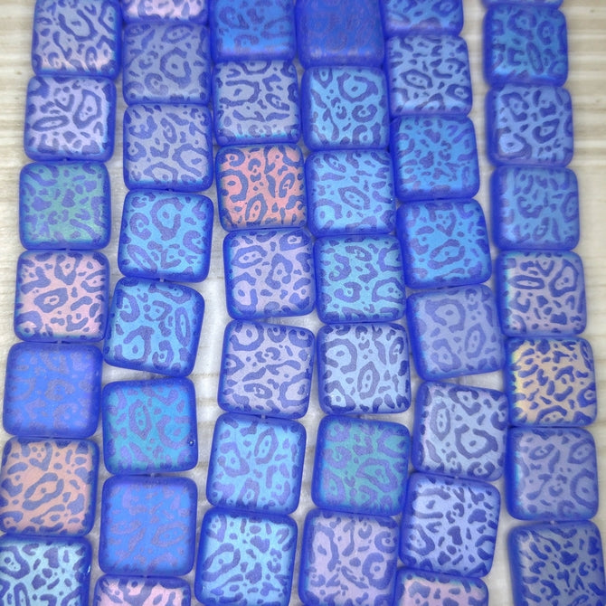 12 x 10mm beads in Matt Sapphire with laser etched Jaguar