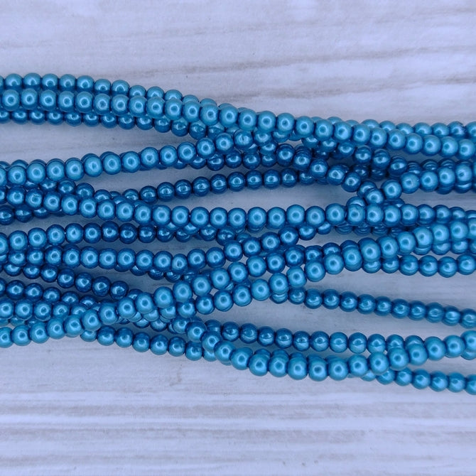 150 x 2mm round pearls in Crystal Poseidon