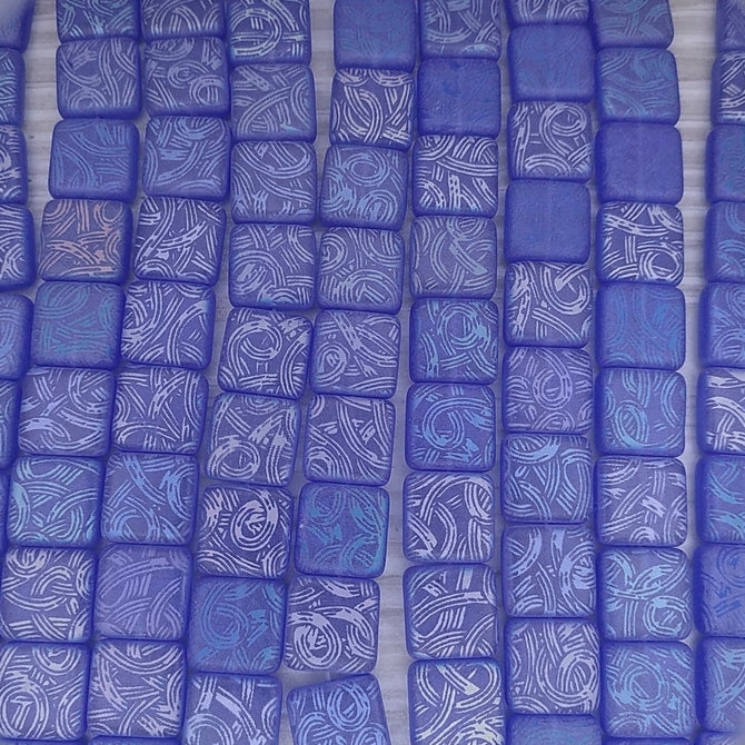 12 x 10mm square beads in Dark Blue with laser etched rope