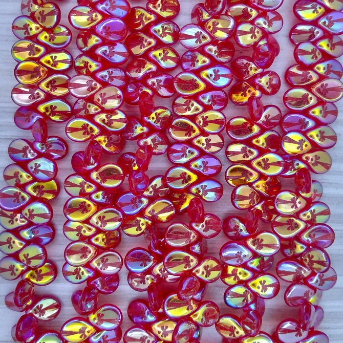 45 x pip beads in Siam Red with laser etched Bow