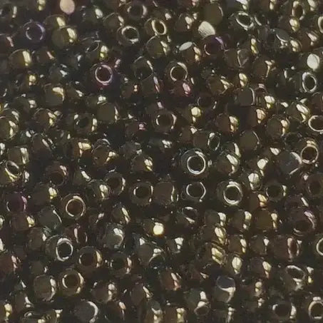 083 - 5g of Size 15/0 Toho charlottes in Metallic Brown Iris