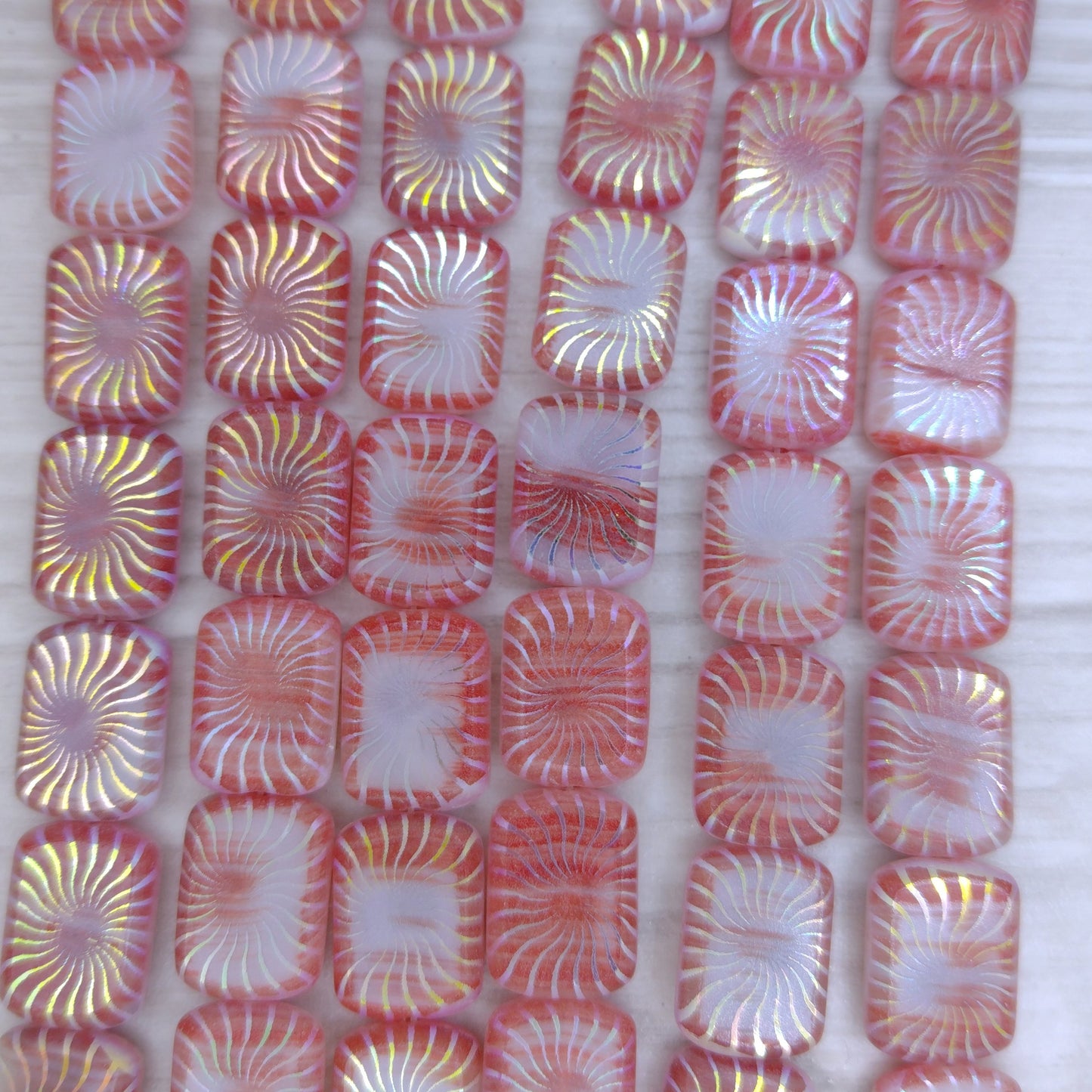 8 x table cut beads in Red Marble with laser etched Urchin (14x10mm)