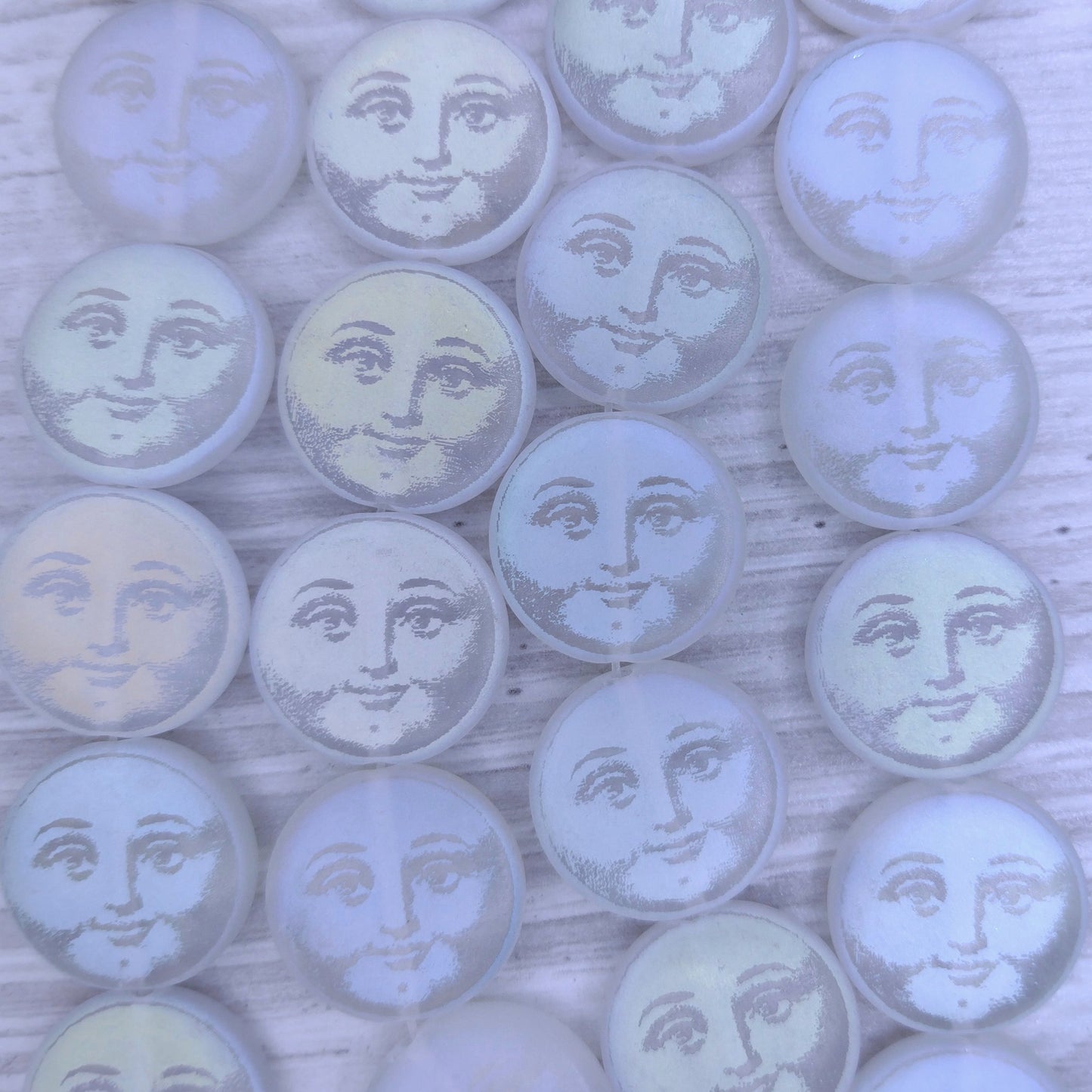 8 x 17mm discs in Matt Crystal with laser etched "Man in the Moon