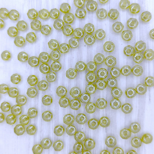 25 x faceted rondelles in Olivine Lustre (2x3mm)