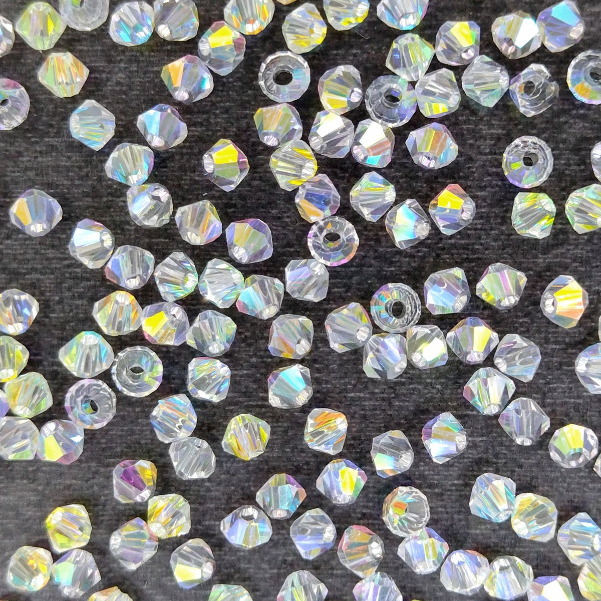 50 x 3mm bicones in Crystal AB (Aurora)