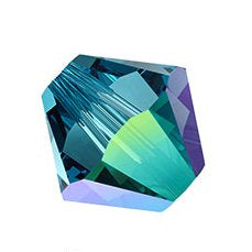 24 x 4mm bicones in Indicolite AB (Preciosa)