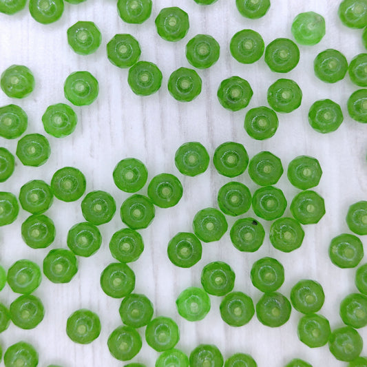 25 x faceted rondelles in Transparent Green (3x5mm)