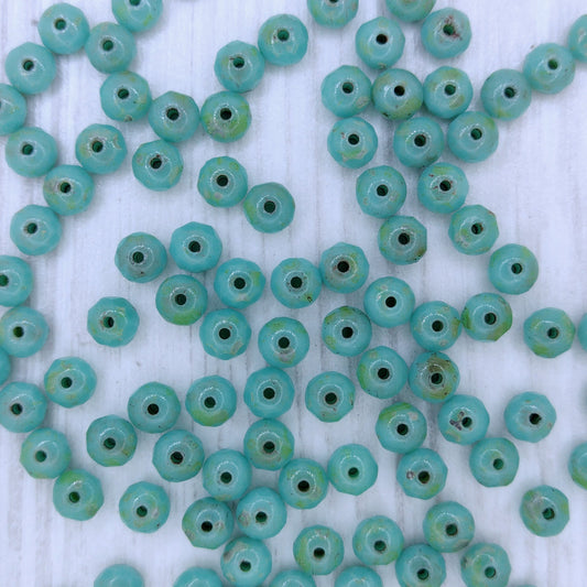 25 x faceted rondelles in Turquoise Picasso (3x5mm)