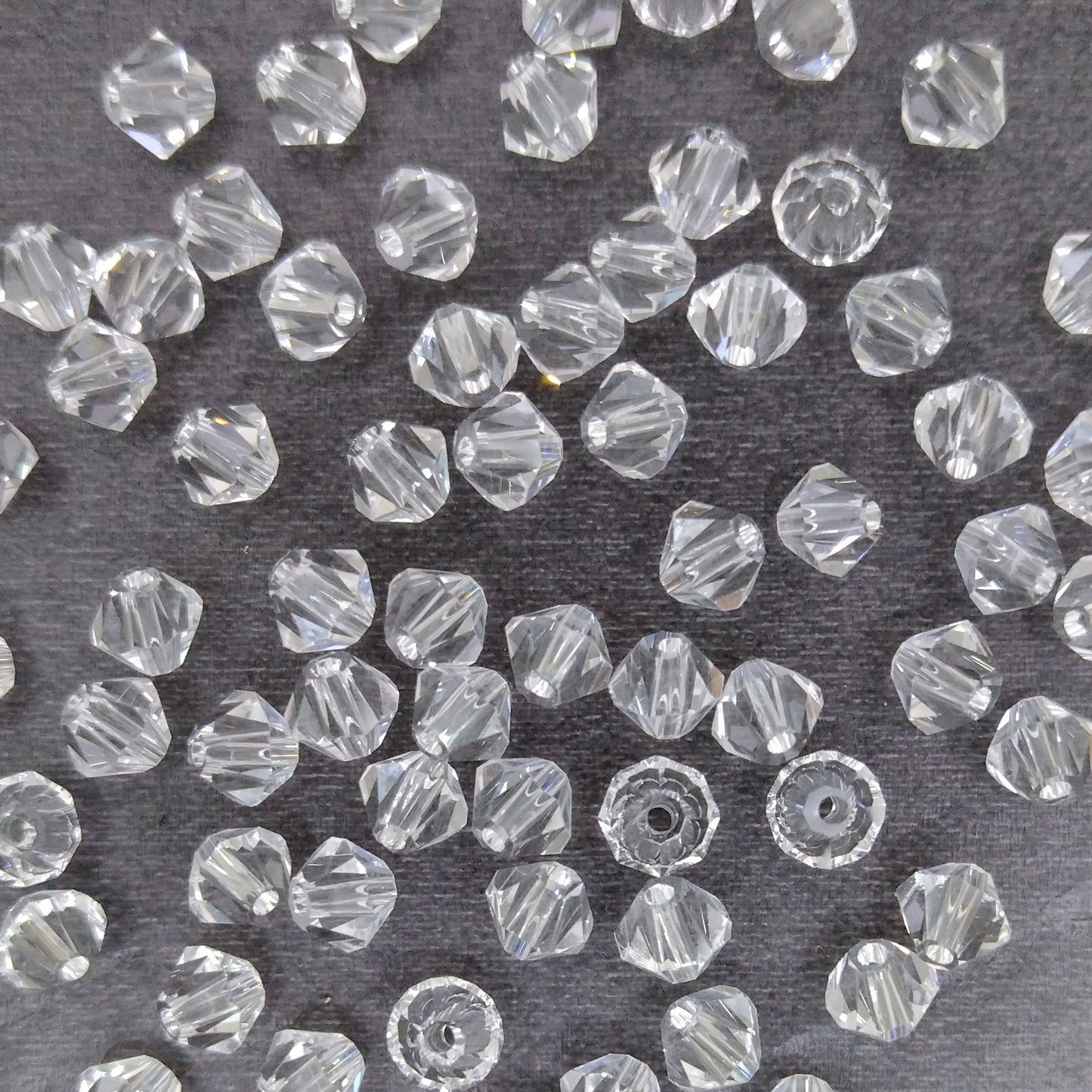 12 x 5mm bicones in Crystal (Aurora)