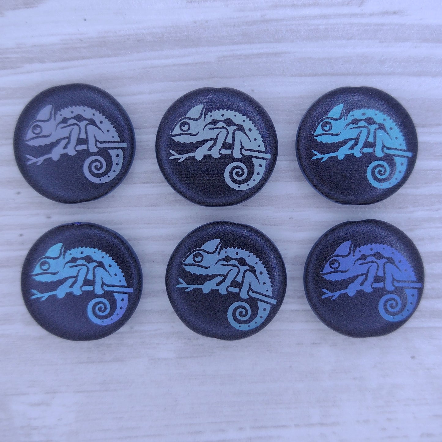 4 x 17mm disc beads in Matt Black with Chameleon