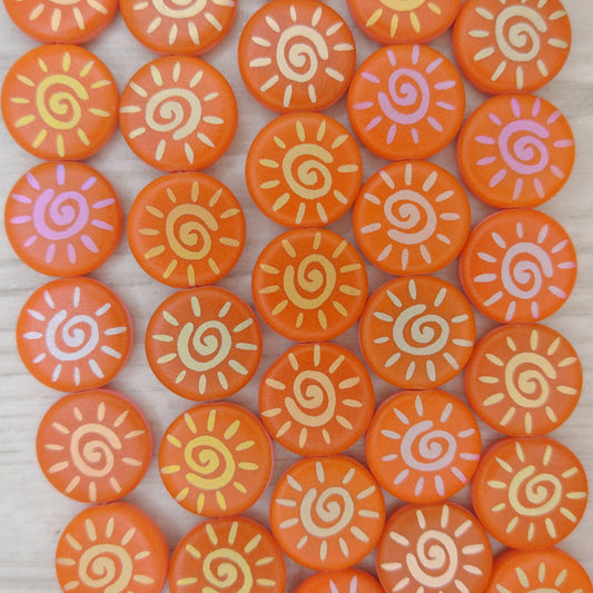 8 x 16mm discs in Matt Orange with laser etched Sun