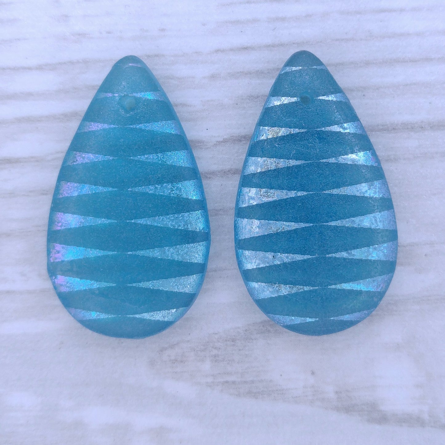 etched Light Blue drop or pendant with laser etched stripes (30x17mm)