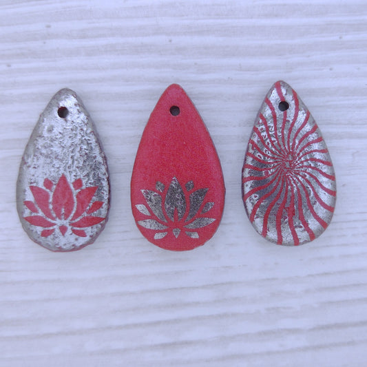 Random Red drop or pendant with laser etched design (30x17mm)