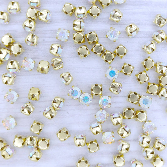 SS12 or 3.3mm in Crystal AB with Gold sew-on setting (Preciosa)