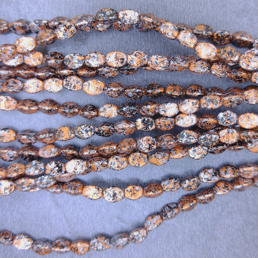 39 x Pinch beads in Tweedy Copper (3x5mm)