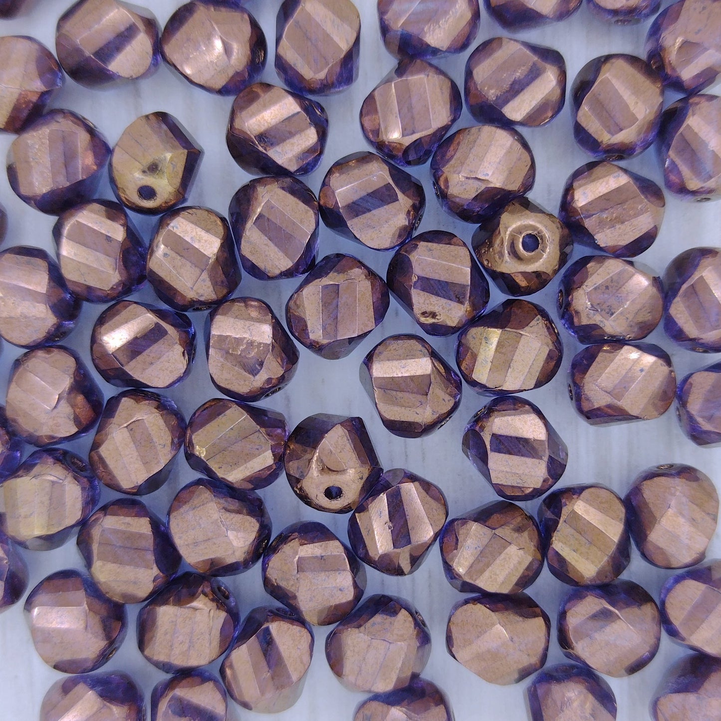 10 x chiselled beads in Crystal/Bronze (8x7mm)