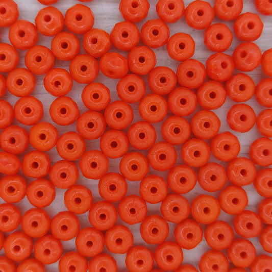 25 x faceted rondelles in Opaque Orange (3x5mm)