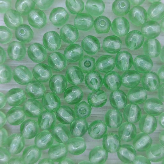 10 x 6mm beads in Light Peridot Lustre with 5 cuts